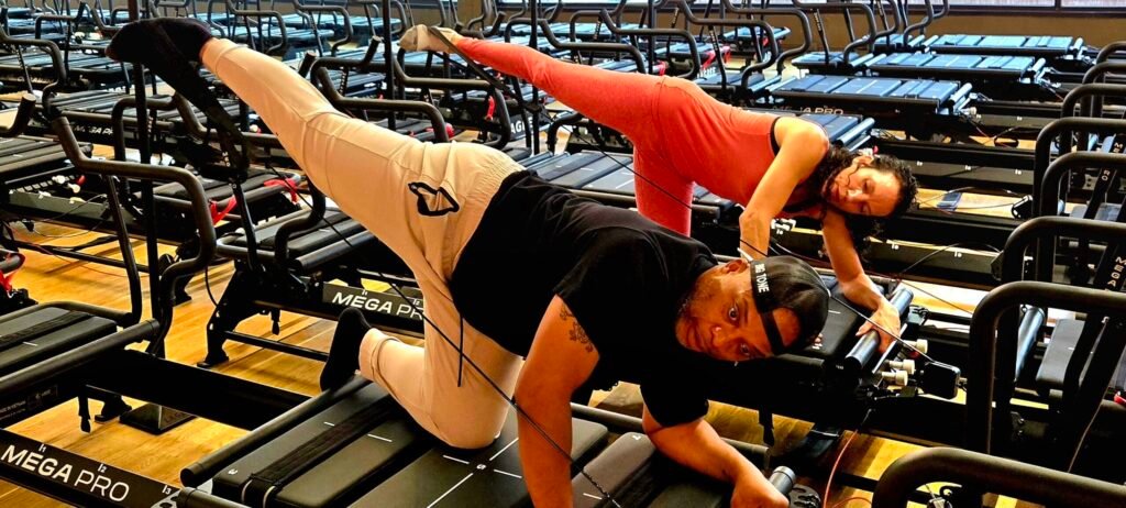 Home Sumya and Tony on Lagree fitness machines